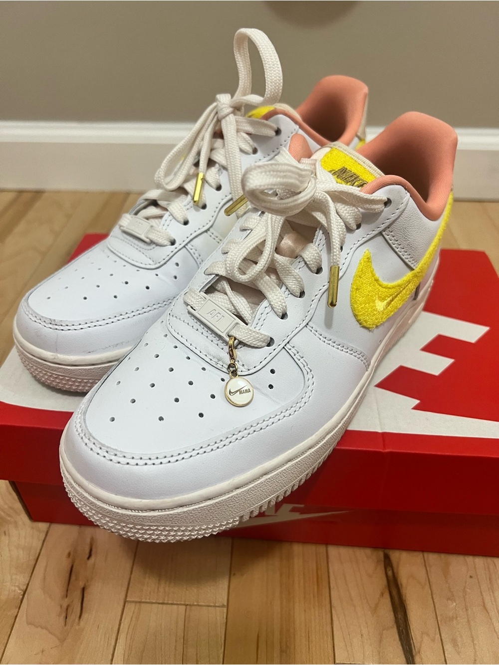 Nike White Sneakers with Yellow Swoosh and Coral Lining